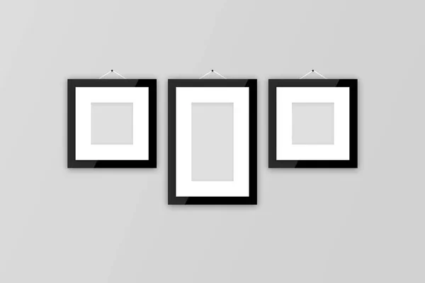 Blank Photo Frames on Gray Wall — Stock Photo, Image