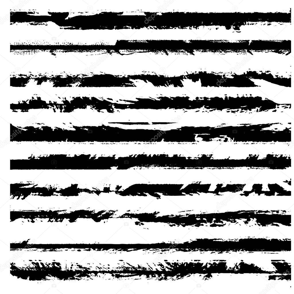 A set of grunge brushes. Black ragged stripes on white background. Abstract stains from paint roller