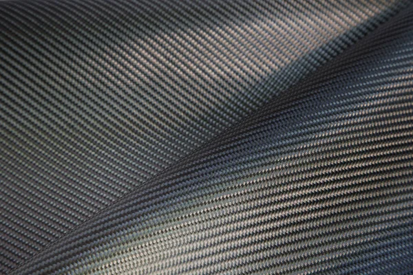 Black Woven Carbon Fiber Composite Texture Reinforcement Car Parts — Stock Photo, Image