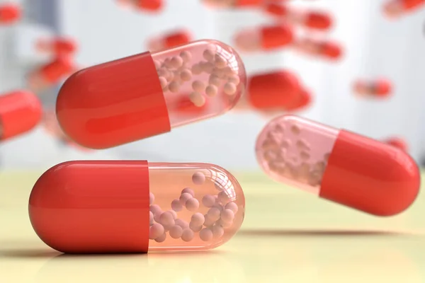 stock image Falling capsules with a drug with nicely blurred background; 3d illustration concept