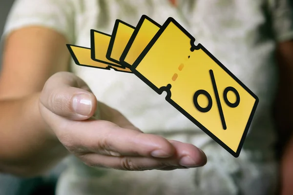 Mão Com Cupons Código Promocional Amarelo Venda Desconto Foto Conceitual — Fotografia de Stock