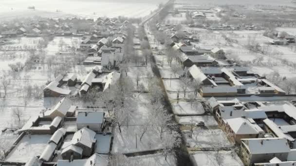 Drone Εναέρια Πλάνα Από Χωριό Στην Πεδιάδα Που Καλύπτονται Χιόνι — Αρχείο Βίντεο