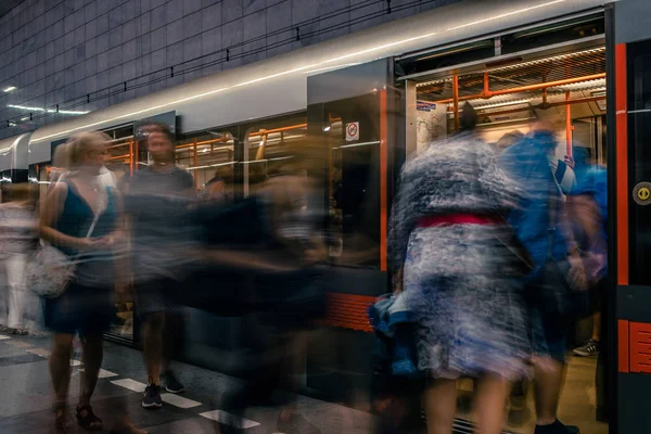 Prague, Czech Republic,23 July 2019; People at metro station entering subway train, long exposure technique for movement. Urban scene, city life, public transport and traffic concept. — Stock Photo, Image