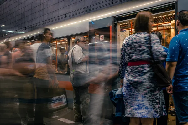 Prague, Czech Republic,23 July 2019; People at metro station entering subway train, long exposure technique for movement. Urban scene, city life, public transport and traffic concept. — Stock Photo, Image