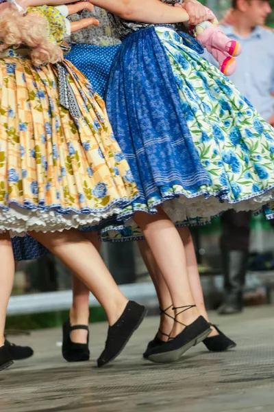 Close up of legs of young Romanian female dancers in traditional folkloric costume. Folklore of Romania — ストック写真