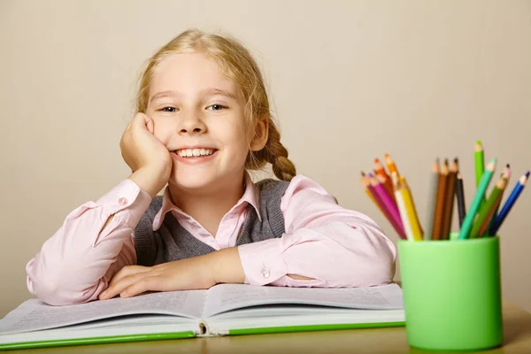 Schoolgirl with a book — Stock Photo, Image