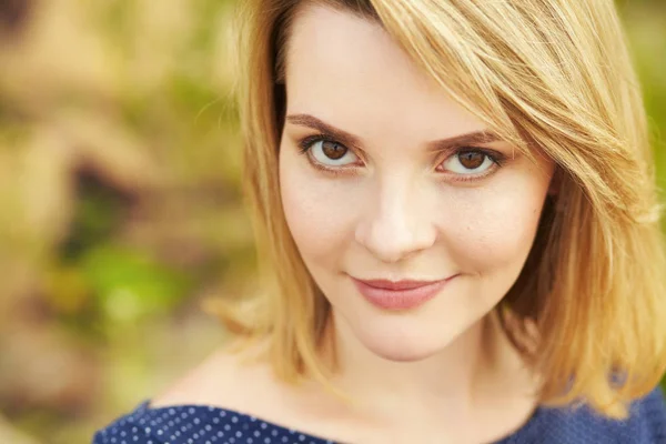 Outdoor closeup portrait of a blonde woman — Stock Photo, Image