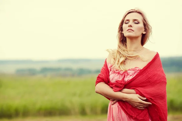 Outdoor portrait of a beautiful middle aged blonde woman — Stock Photo, Image