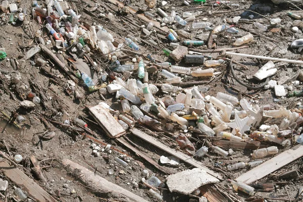 Mountains of city garbage floating in the city river — Stock Image Mountains City Garbage Floating City River Royalty Free Stock Photos