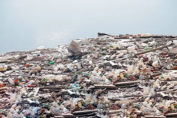 Mountains of city garbage floating in the city river — Stock Image Mountains City Garbage Floating City River Stock Image