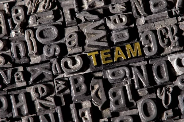 Letras Antiguas Formando Equipo Palabras — Foto de Stock