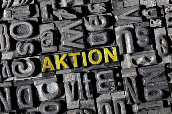 Image Plein Cadre Lettres Fer Mot Allemand Pour Action — Photo