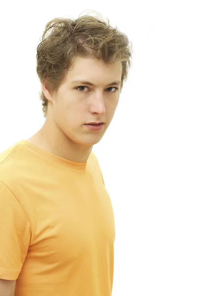 Young Man Yellow Tshirt Posing Studio Serious Face — Stock Photo, Image