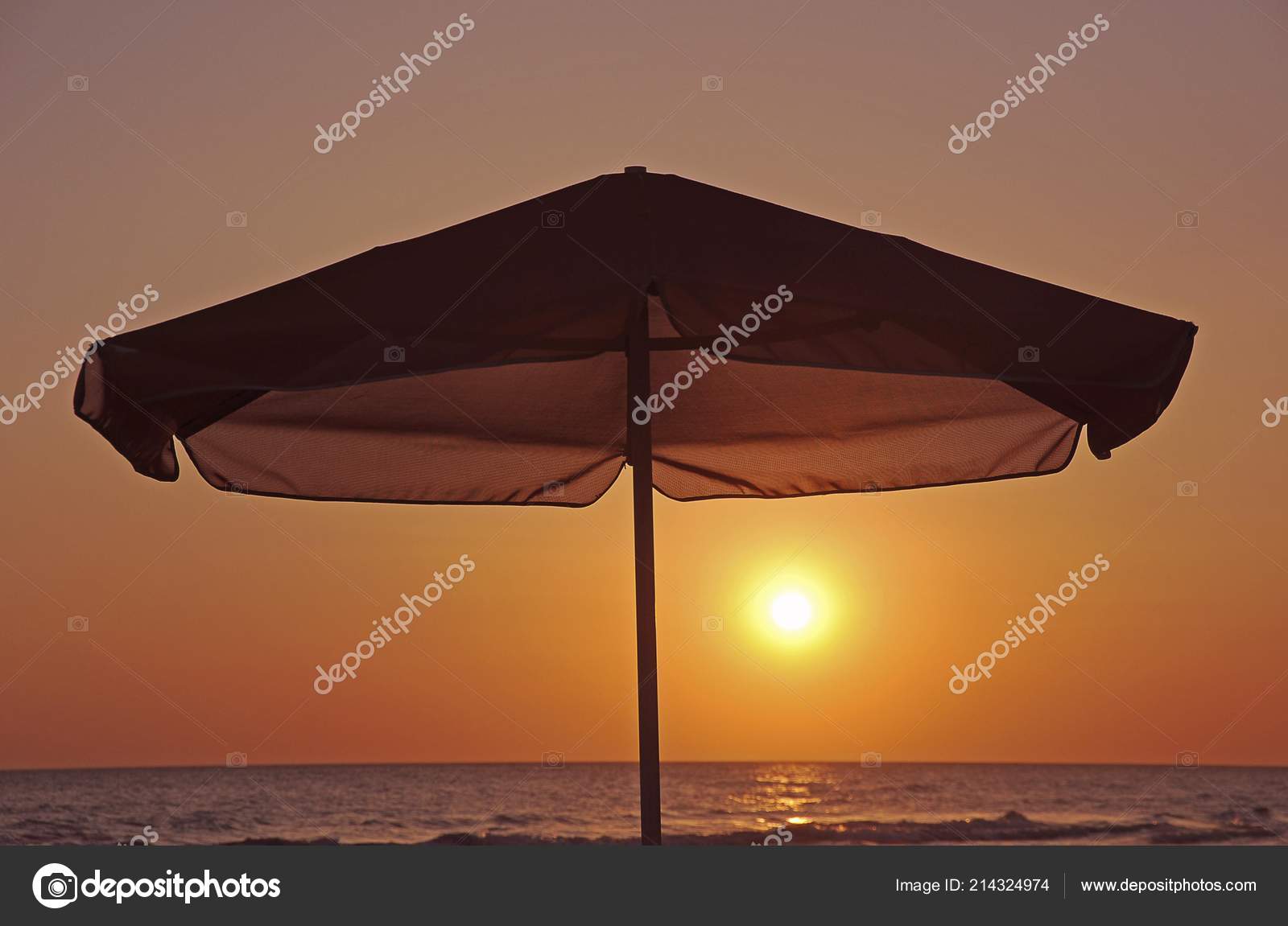 Parasol Sunrise Crete Greece Europe Stock Photo by