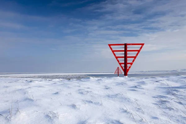 Signal sign with snow, island of Sylt near List, Schleswig-Holstein, Germany, Europe