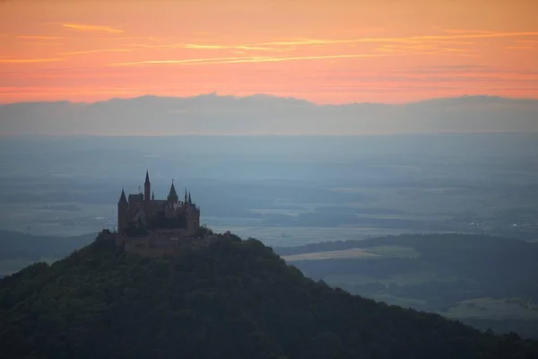 Evening mood with the sunset near Burg Hohenzollern Castle, Swabian Alb, Baden-Wuerttemberg, Germany, Europe