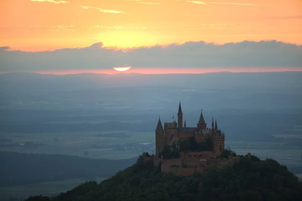 Evening mood with sunset near Burg Hohenzollern Castle, Swabian Alb, Baden-Wuerttemberg, Germany, Europe