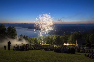 Solstice celebrations with fireworks on Mt Pfaender, Lake Constance at back, near Bregenz, Vorarlberg, Austria, Europe clipart