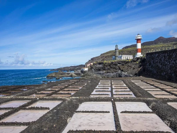 Salt production, Tenegua salt pans, old and new lighthouse at Faro de Fuencaliente, Los Quemados, south coast, La Palma, Canary Islands, Spain, Europe