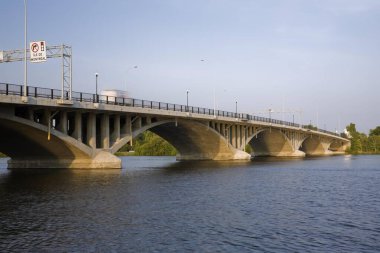 Ahuntsic Bridge, or Viau Bridge, built in 1930, rebuilt in 1962, widened in 1993, spans the Rivire des Prairies between the cities of Laval and Montreal, Quebec, Canada, North America  clipart