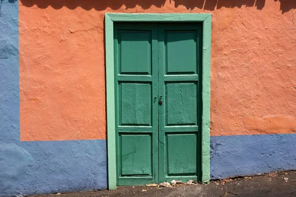 Colorful house wall with door in the historic centre of Los Llanos, La Palma, Canary Islands, Spain, Europe