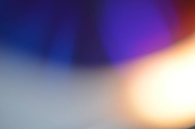 Glitter, defocused ile Cd disk üzerindeki lamba ışığında alınan doğal soyut renkli bokeh arka plan