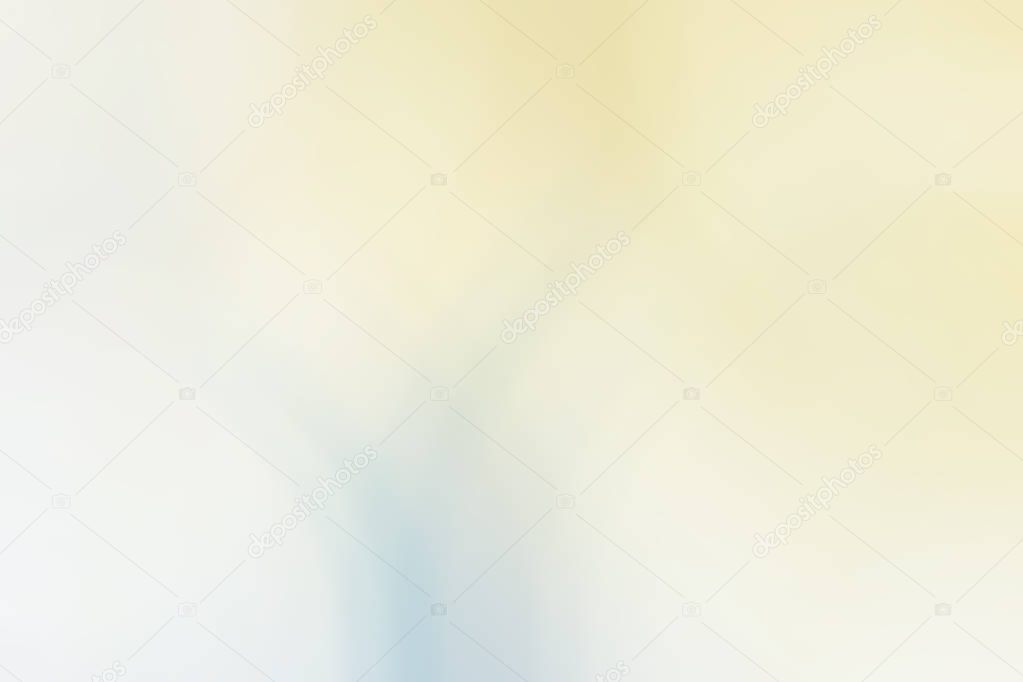 Abstract pastel soft colorful smooth blurred textured background off focus toned in yellow color. Can be used as a wallpaper or for web design