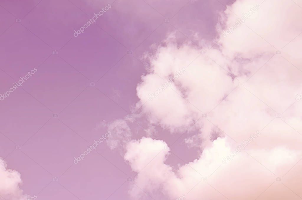 Nature background. Fluffy soft clouds in sky toned