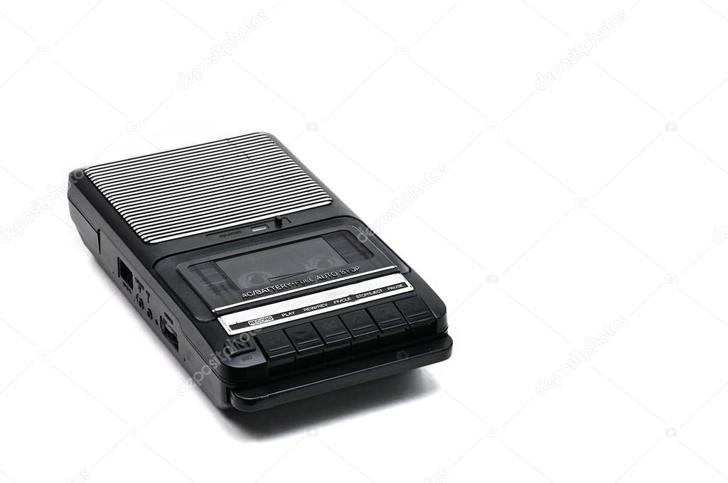 Cassette tape recorder for recording and playing audio cassettes on an white isolated background.Vintage