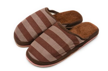 Evde beyaz izole arka plan üzerinde kullanılan terlik. Spor Ayakkabı