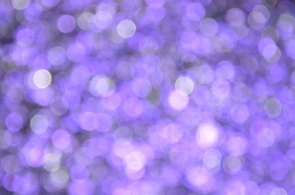 Lila, mor renkli arka plan ile bokeh, yeni yıl ve christma için
