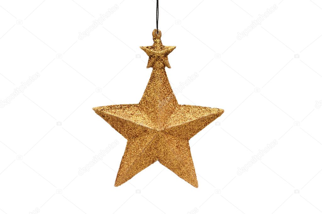 Christmas and New Year's golden five-pointed star on the white isolated background. The toy of old times.