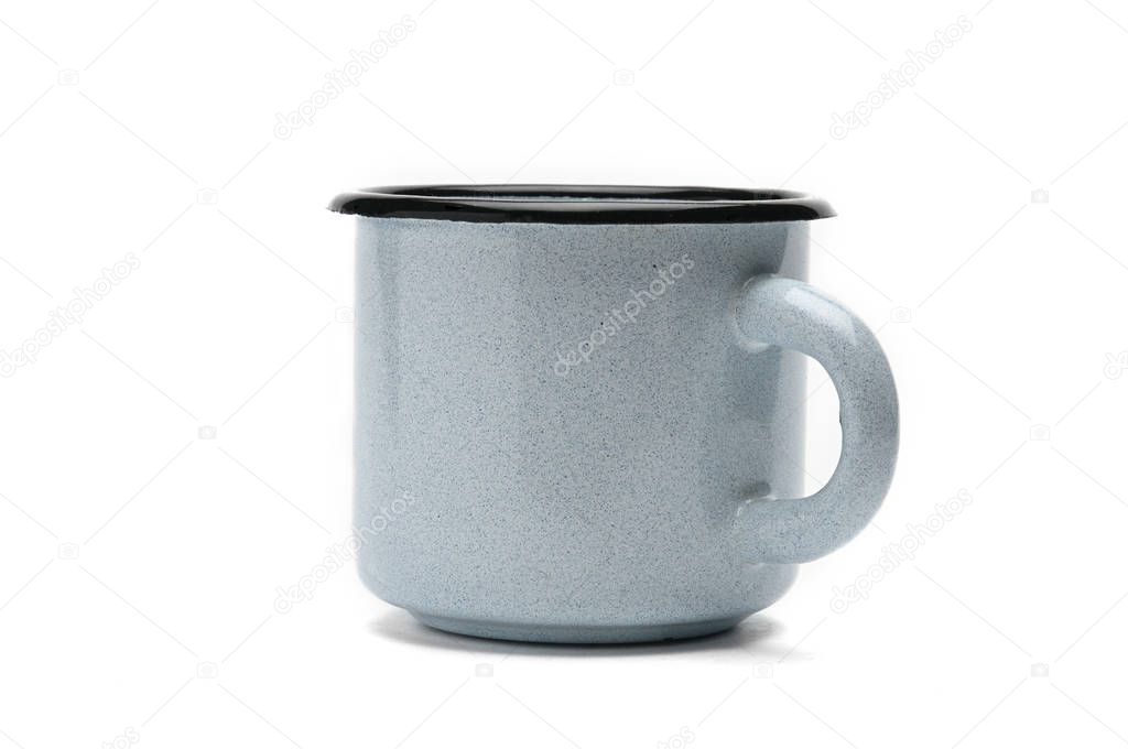 Old iron cup on a white background.Blue mug with black border