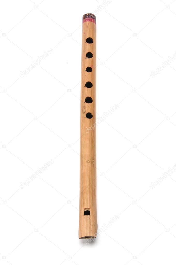 Wind musical instrument flute on white background.Pipe
