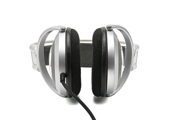 Vintage headphones for listening to sound and music on an isolated white background
