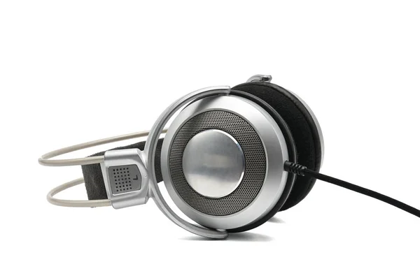 Vintage headphones for listening to sound and music on a white b Stock Picture