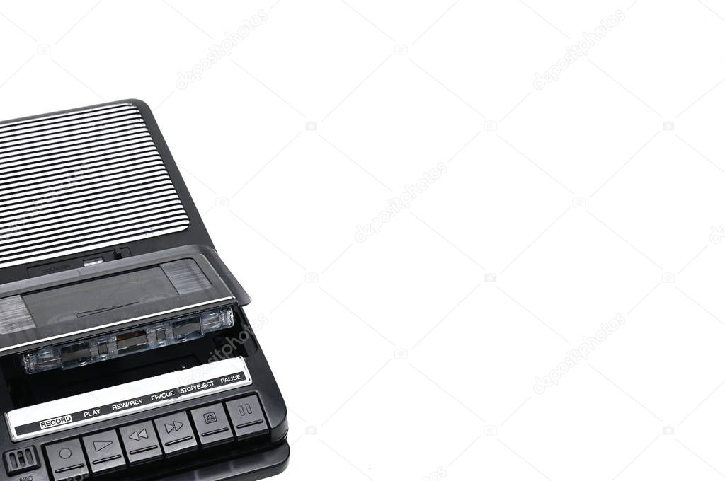 Old-time desktop type cassette recorder on white isolated backgr