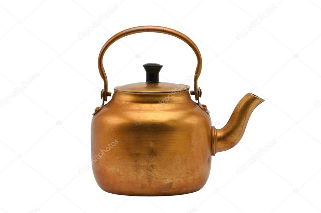Golden metal kettle on a white background.Teapot.