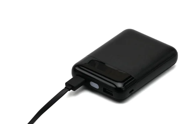 Power Bank med uppladdningsbara batterier på vit bakgrund — Stockfoto