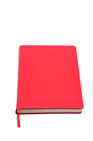 Beyaz zemin üzerine kırmızı defter — Stok fotoğraf