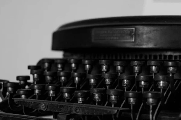 Close up of an old typing machine with cyrillic letter buttons