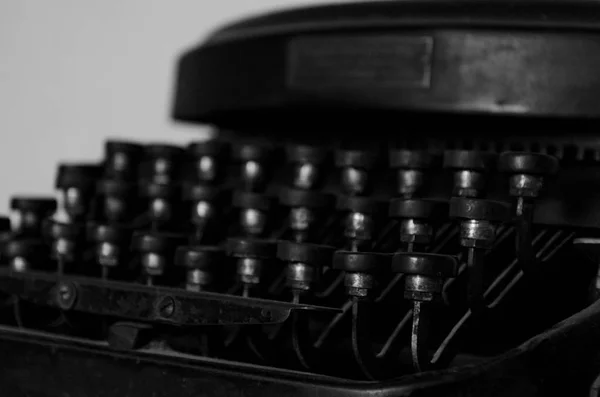 Close up of an old typing machine with cyrillic letter buttons