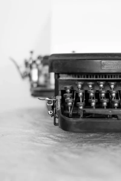 Close up of an old typing machine with cyrillic letter buttons