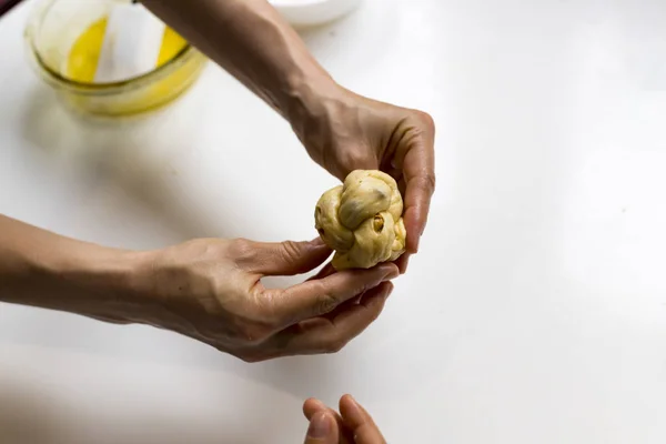 Preparation of home made kozunak (a type of Stollen, or sweet leavened bread, traditional to Romania and Bulgaria)  and Easter eggs