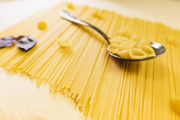 Spoon Background Spaghetti Ingredients Italian Pasta Tomatoes Greens View — Stock Photo, Image