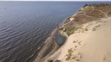 Curonian dunes üzerinde uçuş Nida yanındaki tükürmek.