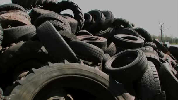 Old rubber wheels for trash factory recycling — Stock Video