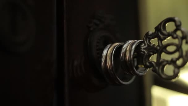 Gold Wedding Rings on the key macro closeup shoot diamon Jewellery — Stock Video