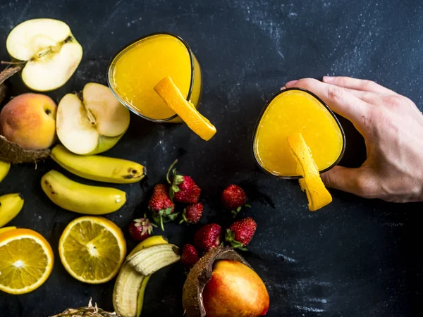 Hand Taking Fresh Orange Smoothie Black Table Fresh Summer Fruits — Stock Photo, Image