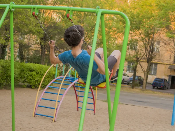 Back View Teenager Boy Swinging Playing Ground — Stock Photo, Image